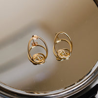 Chokore Chokore Oval Knot Earrings